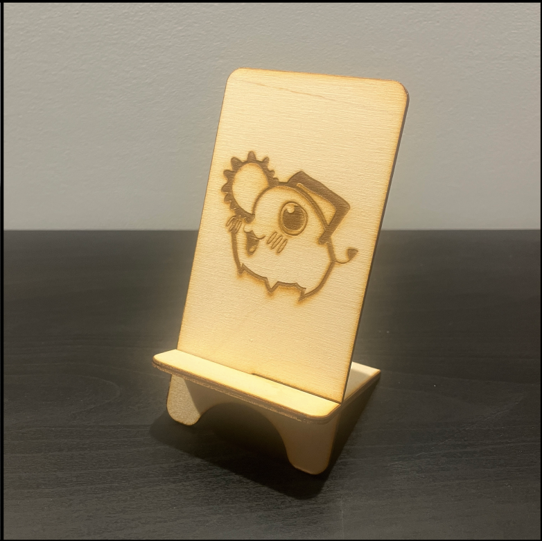 A phone stand that lights up when the two sliding pieces are together, and a phone is placed on top.